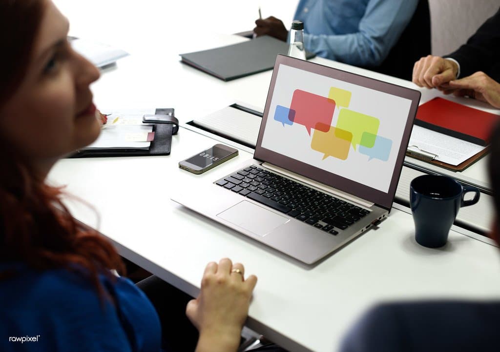 Two people at a laptop during a startup team working session